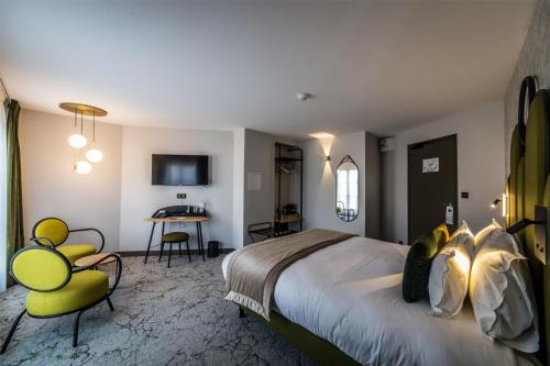 Postel nebo postele na pokoji v ubytování Best Western Le Relais du Vigneron