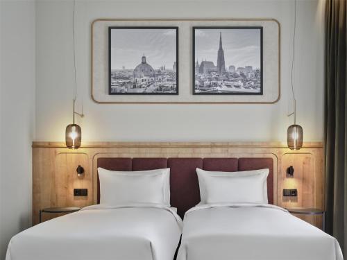 Una cama o camas en una habitación de Radisson Blu Das Triest Hotel, Vienna