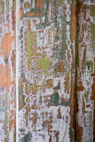 an old wall with peeling paint on it at Pigal in Tarragona