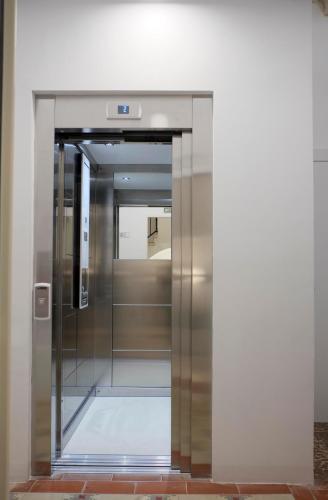 an elevator in a building with its door open at Pigal in Tarragona