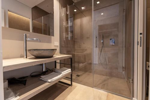 a bathroom with a shower and a sink at Locanda Monte Baldo in Malcesine