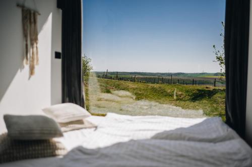 Voodi või voodid majutusasutuse Glamping Na Vyhlídce toas