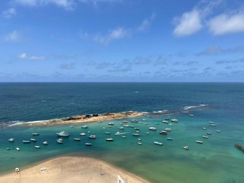 an aerial view of a beach with boats in the water at Family holiday home beach view in Alexandria