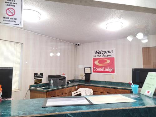 a waiting room with a welcome to theoremite sign on the wall at Econo Lodge Oacoma - Chamberlain West in Oacoma