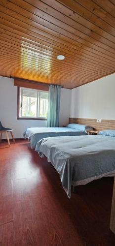 Ένα ή περισσότερα κρεβάτια σε δωμάτιο στο Apartamento San Simón