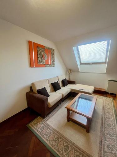 a living room with a couch and a coffee table at As Marismas - Miño in Miño