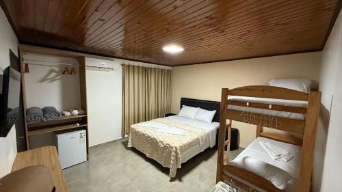 Postel nebo postele na pokoji v ubytování El Rodeo Hospedaje