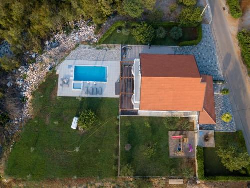an overhead view of a house with a swimming pool at Villa Violet in Grude