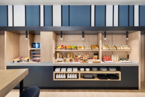 a bakery with a counter with food on display at B&B HOTEL Madrid Alcorcón in Alcorcón