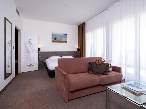 Χώρος καθιστικού στο Golden Tulip La Baule Hôtel et Résidence