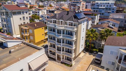 an aerial view of a city with buildings at Sea La Vie Suites in Golem