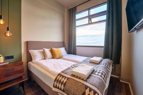 Voodi või voodid majutusasutuse Kex Hostel toas