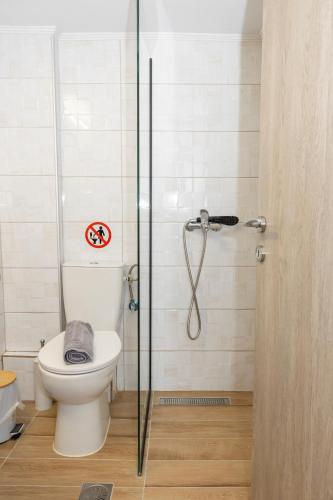 Koupelna v ubytování Mitende Apartments