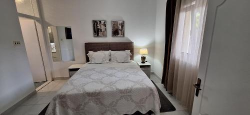Katil atau katil-katil dalam bilik di Apartments 101