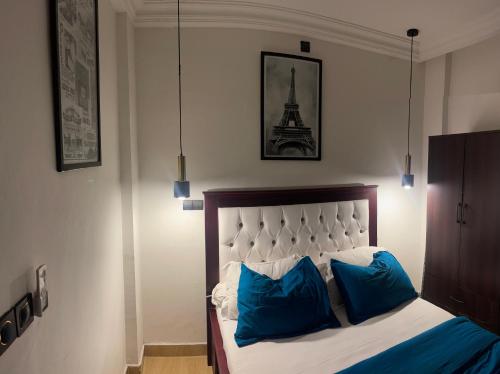 Llit o llits en una habitació de Elie home