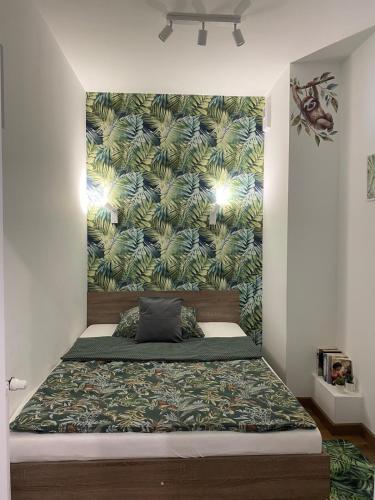 Postel nebo postele na pokoji v ubytování EM Room