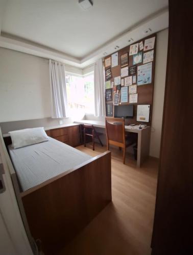 Katil atau katil-katil dalam bilik di Apartamento Completo com garagem - Diamantina