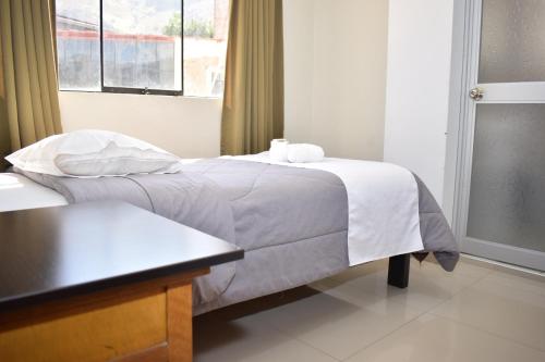 Katil atau katil-katil dalam bilik di Real Inka Hotel