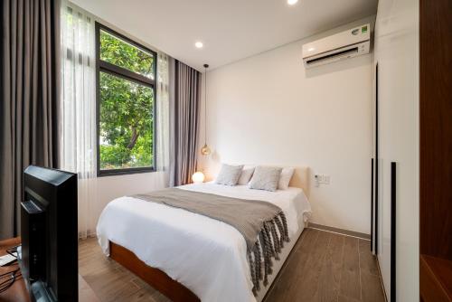 Ένα ή περισσότερα κρεβάτια σε δωμάτιο στο Fullerton House District 1
