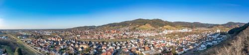 an aerial view of a city with a mountain at DEVA Hotel Renchtalblick in Oberkirch