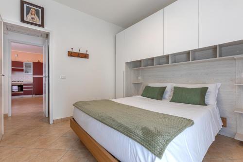 Postel nebo postele na pokoji v ubytování Lido Degli Estensi Flat con Balcone e Parcheggio!