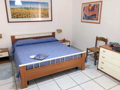 A bed or beds in a room at BlueBay Apartment Gallipolitravel