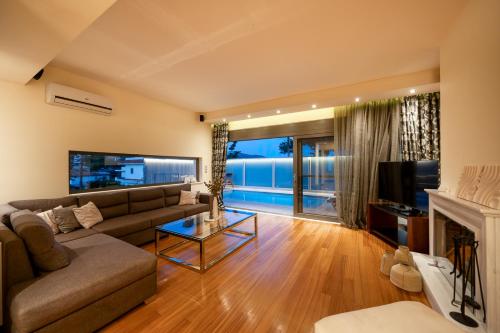 Μια τηλεόραση ή/και κέντρο ψυχαγωγίας στο Villa Occasus by A&D Properties