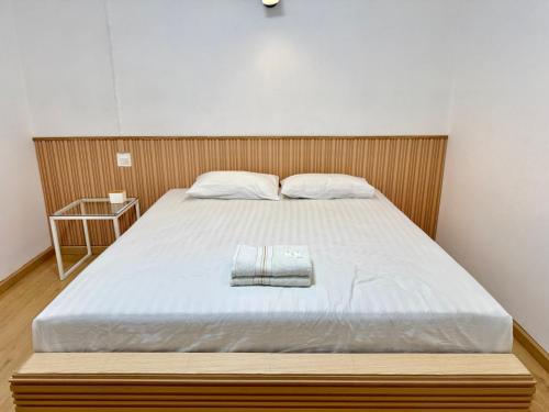 Ένα ή περισσότερα κρεβάτια σε δωμάτιο στο Pophouse