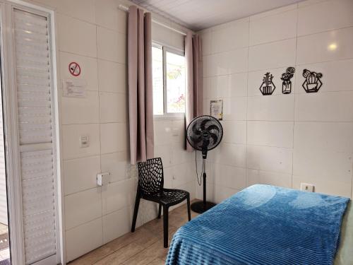 Ένα ή περισσότερα κρεβάτια σε δωμάτιο στο Buona Notte Hostel & Pousada