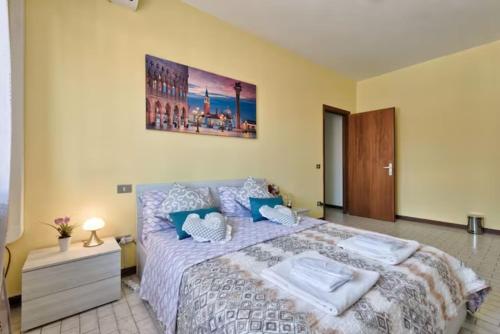 Postel nebo postele na pokoji v ubytování Venice Miramare Residence 2