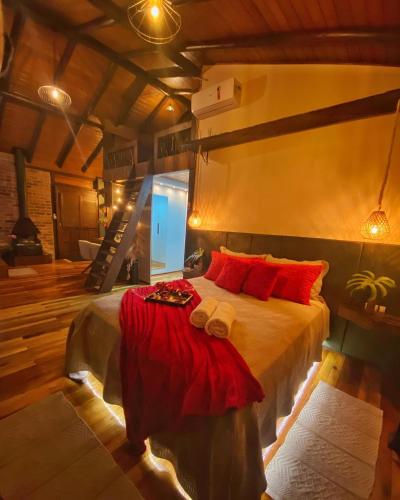 Katil atau katil-katil dalam bilik di Cabana com visual incrível para a Serra