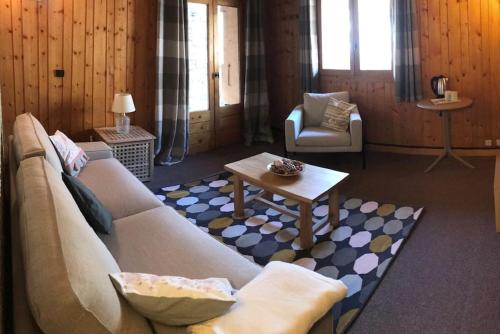 Posezení v ubytování Chalet Le Cordava