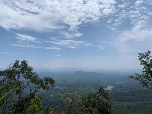 a view of a valley under a cloudy sky at Nobel Regency in Bibile