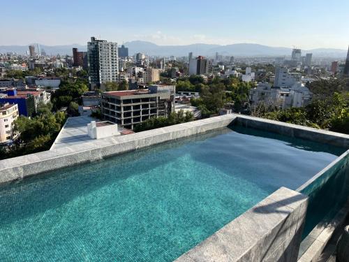 Swimmingpoolen hos eller tæt på Hermoso Loft en la Roma Norte