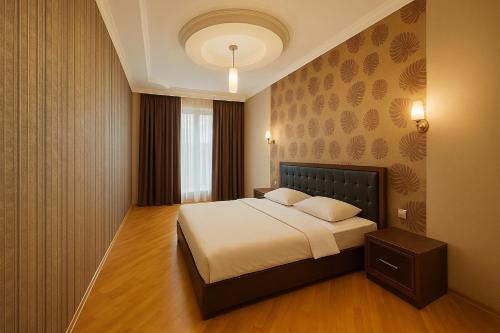 Postel nebo postele na pokoji v ubytování 2-room luxurious apt - BAKU MALL