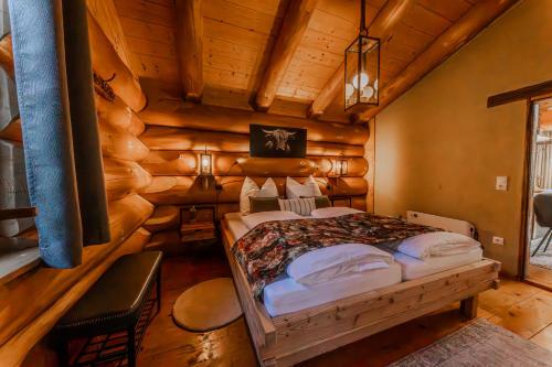 Postel nebo postele na pokoji v ubytování Chalet Vogelkirsche