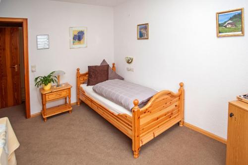 מיטה או מיטות בחדר ב-Waldhotel Auerhahn B&B Bed & Breakfast