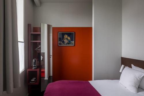 Postel nebo postele na pokoji v ubytování Hotel Pilar