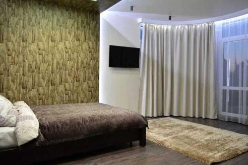 Μια τηλεόραση ή/και κέντρο ψυχαγωγίας στο Apartments Tatiy