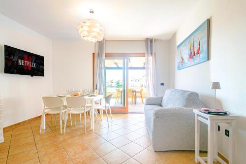 Μια τηλεόραση ή/και κέντρο ψυχαγωγίας στο Residenze Padule 3 bedr, Terrace Sea View, Parking