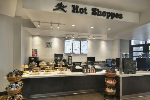 a hot shop with a counter with baskets of food at Torrance Marriott Redondo Beach in Torrance