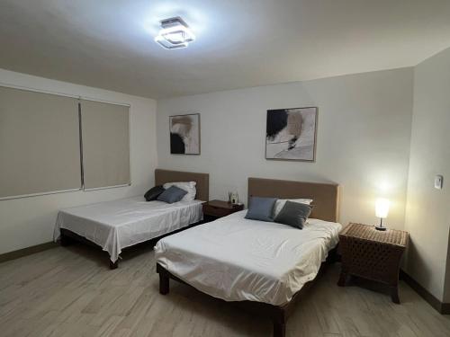 Ένα ή περισσότερα κρεβάτια σε δωμάτιο στο Villa Turix up to 16