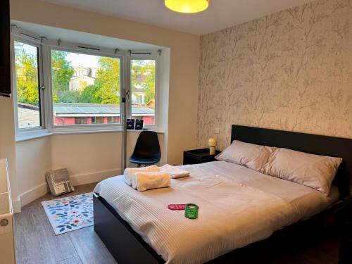 Postel nebo postele na pokoji v ubytování 40th Avenue Guest House