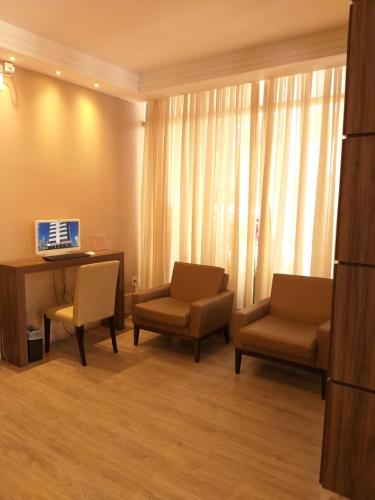 Hotel Geraniumにあるテレビまたはエンターテインメントセンター