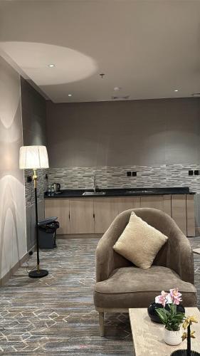 Χώρος καθιστικού στο الإقامة الذهبية للشقق المخدومة Golden Residence Hotel