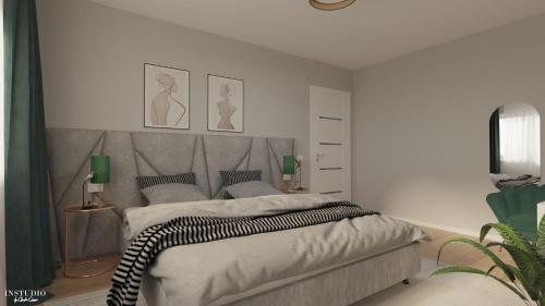 Una cama o camas en una habitación de Relaxare modernă în Timișoara casă cu birou parcare și WiFi, aproape de obiective
