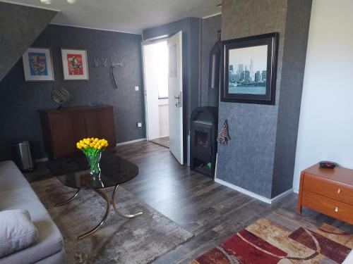 Coin salon dans l'établissement Ferienwohnung 'Frühauf' im Südharz OT Uftrungen