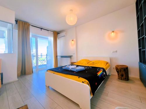 Ένα ή περισσότερα κρεβάτια σε δωμάτιο στο PLAZA VIEW Studio