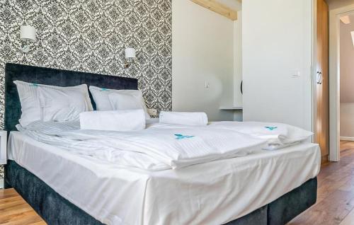 Ένα ή περισσότερα κρεβάτια σε δωμάτιο στο Pet Friendly Apartment In Nowecin