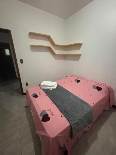Ένα ή περισσότερα κρεβάτια σε δωμάτιο στο Casa do Sítio Palmeira - Pomerode